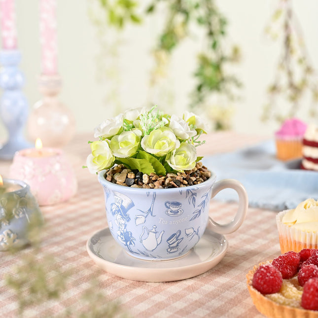 Pflanzgefäß: Teetasse mit Kunstpflanze – Alice im Wunderland