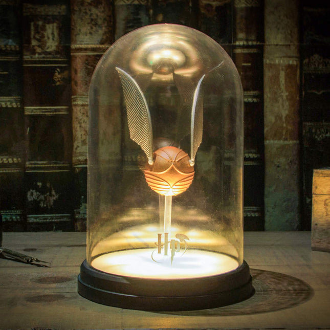 Lampe: Goldener Schnatz in Glasglocke